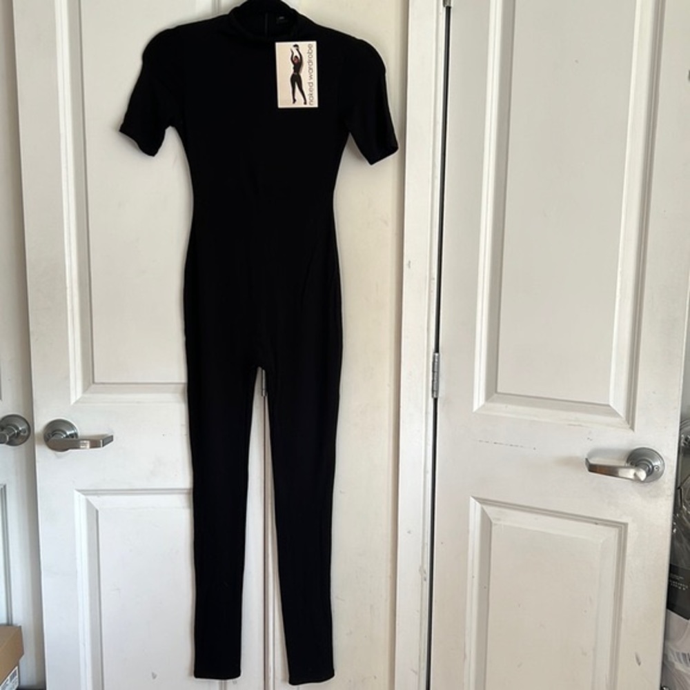 New black naked wardrobe bodysuit size small.